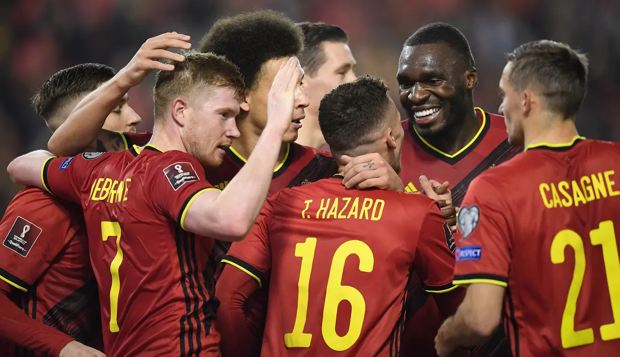 Skor 3-1 bertahan hingga laga usai. Dengan hasil ini Belgia memastikan lolos ke Putaran Final Piala Dunia 2022 dari Grup E. Dengan menyisakan 1 laga, raihan 19 poin Belgia di posisi pertama tidak akan terkejar oleh Wales di posisi kedua dengan koleksi 14 poin. (AFP/John Thys)