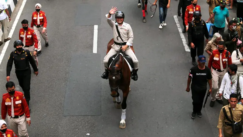 Eri Cahyadi saat mengikuti Parade Juang Surabaya. (Dian Kurniawan/Liputan6.com)