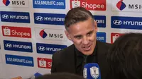 Pelatih Timnas Indonesia, John Herdman berbicara kepada awak media di sela acara pengundian babak grup ASEAN Championship 2026 di Studio RCTI Plus, Jakarta, Kamis (15/1/2026). (Bola.com/Nur Iman Ali)