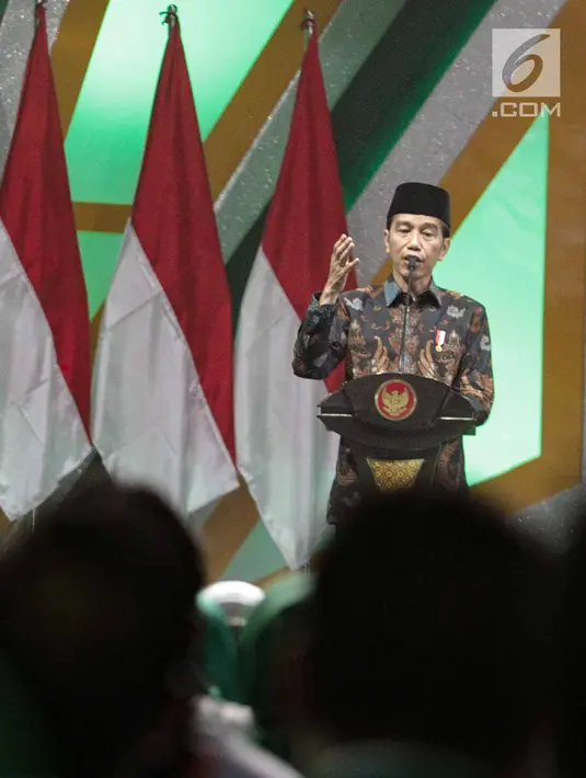 Presiden Joko WIdodo memberikan sambutan ketika menghadiri Harlah ke-46 PPP di kawasan Ancol, Jakarta, Kamis (28/2). harlah ke-46 PPP mengusung tema ‘Membangun Keluarga Membangun Bangsa’. (Liputan6.com/Faizal Fanani)