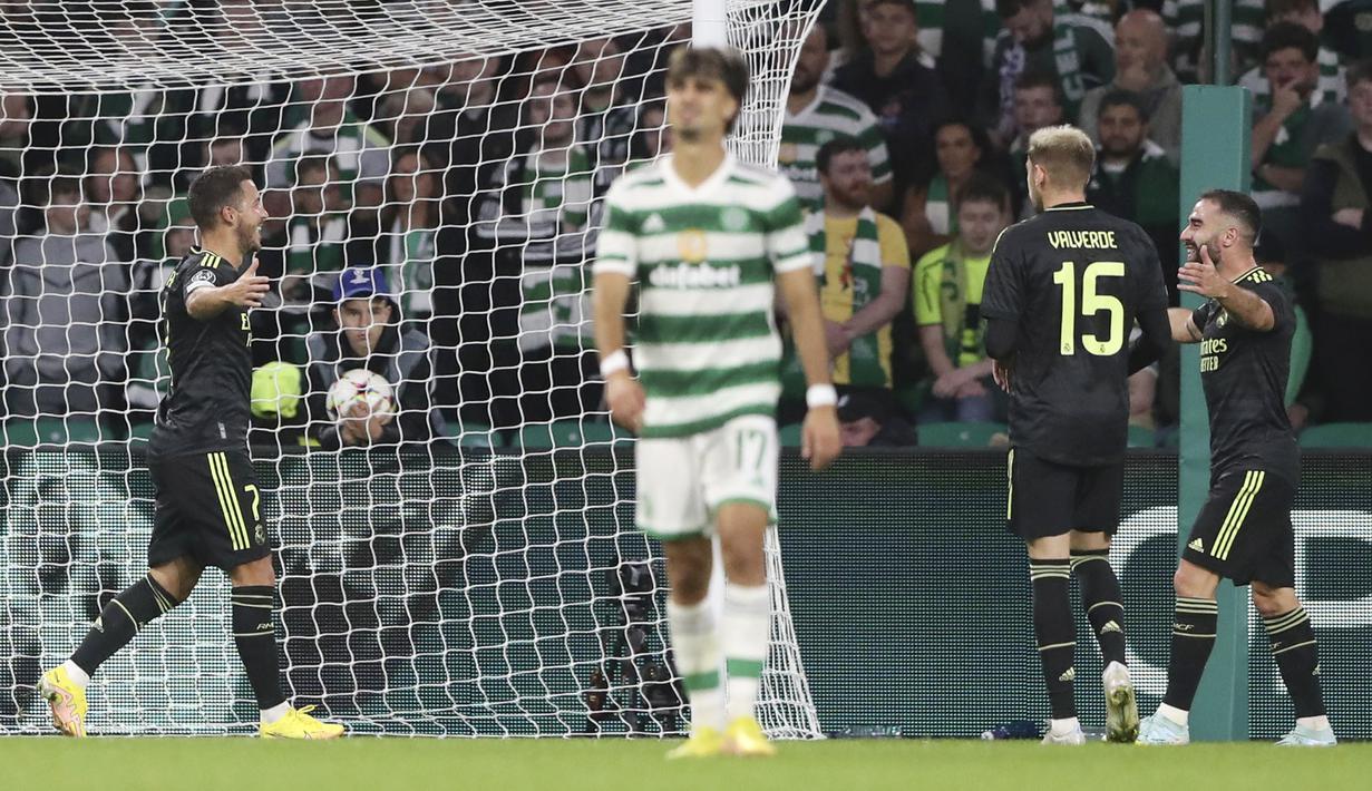 Eden Hazard akhirnya kembali mencetak gol untuk Real Madrid. Pemain asal Belgia itu terakhir kali menyumbang gol untuk Los Blancos pada Januari 2022 lalu tepatnya saat duel melawan Elche. (AP/Scott Heppell)