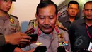  Kapolri Jenderal Pol Badrodin Haiti memberikan keterangan pers terkait pertemuan tertutup yang membahas pelanggaran HAM berat masa lalu di Kejaksaan Agung, Jakarta, Selasa (21/4/2015). (Liputan6.com/Yoppy Renato)