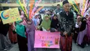 Sejumlah siswa SDI Al Hidayah Cinere mengikuti pawai menyambut Tahun Baru Islam 1 Muharram 1445 Hijriah di Cinere, Depok, Jawa Barat, Selasa (18/7/2023). (merdeka.com/Arie Basuki)