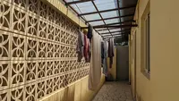 7 Ide Jemuran Samping Rumah Lebar 1 Meter dengan Roster dan Atap Terang