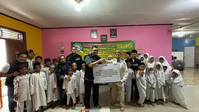 BRI Insurance menyalurkan bantuan peralatan sekolah dan biaya operasional ke dua yayasan di Jakarta Timur dan Jakarta Utara. (Dok BRINS)