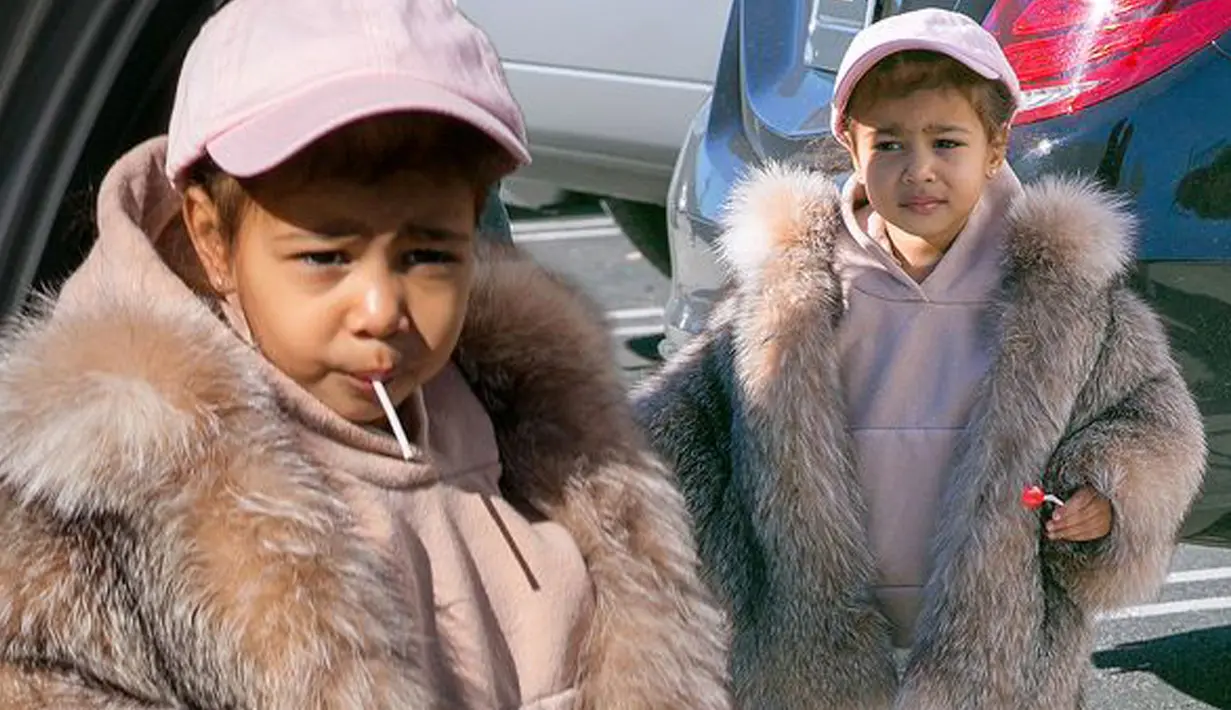 North West, putri kecil pasangan Kanye West dan Kim Kardashian tampil modis dengan mantel bulu saat menghabiskan waktu bersama sepupu-sepupunya dan juga Kourtney Kardashian di kawasan Los Angeles, Selasa (29/12). (mirror.co.uk)