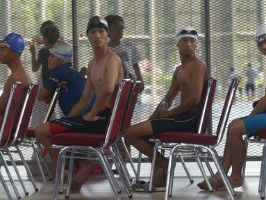 Atlet para swimming mengikuti kejuaaran 2nd Jakarta Open Para Swimming Championship 2019 di GBK Aquatic Center, Jakarta, Sabtu (29/11/2019). Kejuaran renang yang diikuti para atlet disabilitas ini dapat menumbuhkan atlet disabilitas yang unggul dan bisa mewakili Indonesia. (merdeka.com/Imam Buhori)