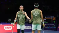 Fajar Alfian/Muhammad Rian Ardianto beraksi pada Kejuaraan Badminton Asia. (Dok. Bola.com/PBSI)