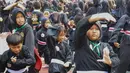 Pesilat dari berbagai perguruan silat se-Jabodetabek mengikuti Flash Mob Pencak Silat saat kegiatan CFD di kawasan Bundaran HI Jakarta, Minggu, 9 Agustus 2026. (KLY/Arie Basuki)