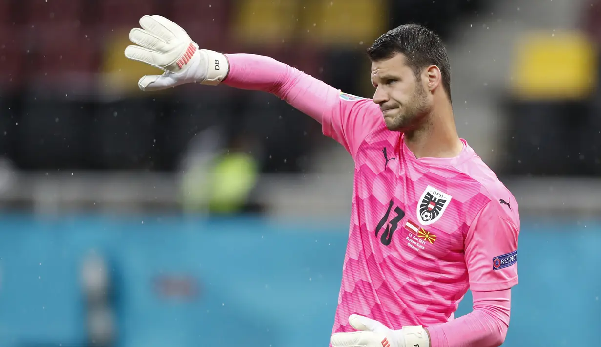 Daniel Bachmann. Kiper Watford berusia 26 tahun ini sukses membawa timnya kembali bermain di Premier League musim depan. Di Euro 2020 bersama Timnas Austria ia telah tampil 2 kali dengan catatan 1 kali menang dan 1 kali kalah dan kebobolan 3 gol. (Foto: AP/Pool/Vadim Ghirda)