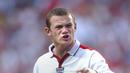 Rooney menjadi pemain termuda yang bermain untuk Inggris. Rooney pertama tampil dalam pertandingan persahabatan melawan Australia pada 12 Februari 2003 saat berumur 17 tahun. (AP/Adam Butler/File)