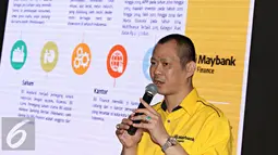 Presiden Direktur Maybank Finance Alexander menyampaikan kata sambutan dalam acara peresmian identitas baru BII Finance menjadi Maybank Indonesia Finance di Jakarta, Kamis (7/1). (Liputan6.com/Immanuel Antonius)