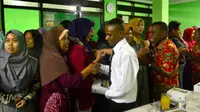 Rayakan Wisuda, Warga Menur Surabaya Gelar Syukuran Buat Mahasiswa Papua