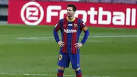 Bintang Barcelona Lionel Messi saat laga melawan Valencia pada lanjutan Liga Spanyol di Camp Nou, Sabtu (19/12/2020). (AP Photo/Joan Monfort)