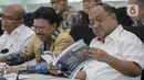 (ki-ka) Menko PMK Muhadjir Effendy, Menkominfo  John G Plate, Ketum KONI Marciano Nurman saat hadir dalam rapat koordinasi tingka menteri di Kantor Kemenkom PMK, Jakarta, Kamis (5/2/2020). (Liputan6.com/Faizal Fanani)
