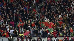 Gelandang Portugal, Matheus Nunes melakukan selebrasi usai mencetak gol ke gawang Turki pada pertandingan playoff Piala Dunia 2022 di stadion Dragao di Porto, Portugal, Jumat (25/3/2022). Portugal menang atas Turki 3-1. (AP Photo/Luis Vieira)