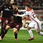 AC Milan kalah dari Olympiakos dengan skor 1-3. (AFP/Aris Messinis)