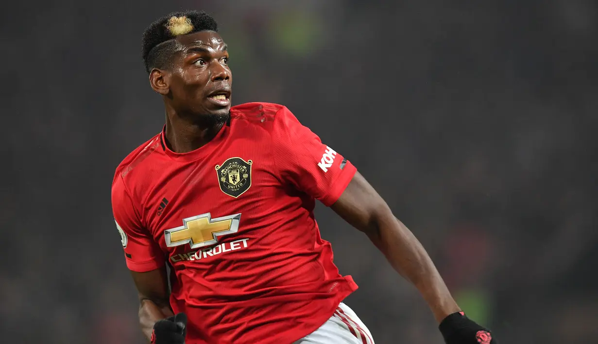 Paul Pogba - Paul Pogba dikenal sebagai muslim yang taat, Pogba beberapa kali menjalankan ibadah umrah ke Mekah. Sama seperti tahun-tahun sebelumnya, tahun ini Pogba juga meneruskan ibadah puasa meski dibayangi gangguan pandemi virus corona. (AFP/Paul Ellis)