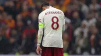 Kapten Manchester United, Bruno Fernandes, merasa kecewa timnya hanya mampu bermain imbang 3-3 kontra Galatasaray&nbsp;pada laga kelima Grup A Liga Champions musim ini, Kamis (30/11/2023) dini hari WIB. (AP Photo)
