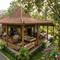Rumah Kampung dengan Serambi Luas untuk Tempat Berkumpul Keluarga (Sumber: gemini.com)