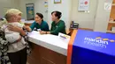 Direktur Utama Mandiri Inhealth Iwan Pasila (tengah) usai peresmian Mandiri Inhealth, Tangerang,Selasa, (12/9). Mandiri Inhealth Managed Care mulai dari plan silver dan peserta Indemnity di sekitar Tangerang dan Kalideres. (Liputan6.com/Helmi Afandi)