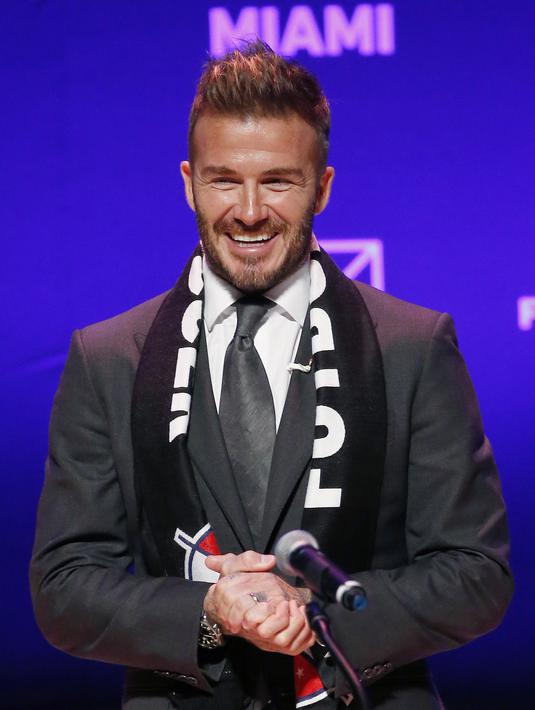 9. David Beckham - Demi menjaga mobilitas, Beckham membeli Bombardier Challenger 350 seharga 18 juta Dolar. Hal tersebut dilakukan demi memudahkannya melakukan perjalanan keliling dunia. (AFP/Rhona Wise)