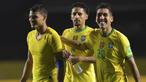 Pemain Brasil, Roberto Firmino, Thiago Silva dan Marquinhos, merayakan kemenangan atas Venezuela pada laga lanjutan kualifikasi Piala Dunia 2022 zona CONMEBOL di Stadion Morumbi, Sabtu (14/11/2020) pagi WIB. Brasil menang 1-0 atas Venezuela. (AFP/Nelson Almeida/pool)