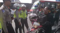 Larangan sepeda motor melintasi MH Thamrin sampai Jalan Medan Merdeka Barat  (Liputan6.com/ Hanz Jimenez Salim)