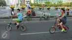 Suasana Car Free Day di Bundaran HI, Jakarta, Minggu (21/6). Pada Bulan Puasa ini suasana di CFD sepi pengunjung dikarenakan sebagian umat muslim menjalankan ibadah puasa. (Liputan6.com/Herman Zakharia)