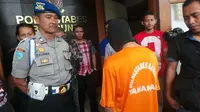 Wanda pembunuh Yusi diperiksa oleh polisi di Mapolrestabes Bandung, Jawa Barat. (Liputan6.com/Okan Firdaus)