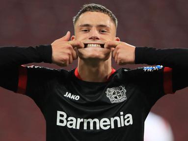 Florian Wirtz merupakan pemain muda andalan Bayer Leverkusen. Dirinya tercatat mampu lesatkan delapan gol dan delapan assist dari 38 penampilan di semua kompetisi pada musim 2020/2021. Saat ini Florian Wirtz terctat memiliki nilai banderol 45 juta Euro. (Foto: AFP/Pool/Wolfgang Rattay)