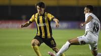 Facundo Pellistri saat bermain di Penarol. (AFP/Sandro Pereyra)