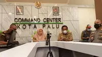 Rapat koordinasi Pemkot Palu bersama Forkompinda untuk penerapan Pengetatan PPKM Mikro dipimpin oleh Wakil Wali Kota Palu, Reny Lamadjido (tengah), Selasa (6/7/2021). (Foto: Heri Susanto/ Liputan6.com).