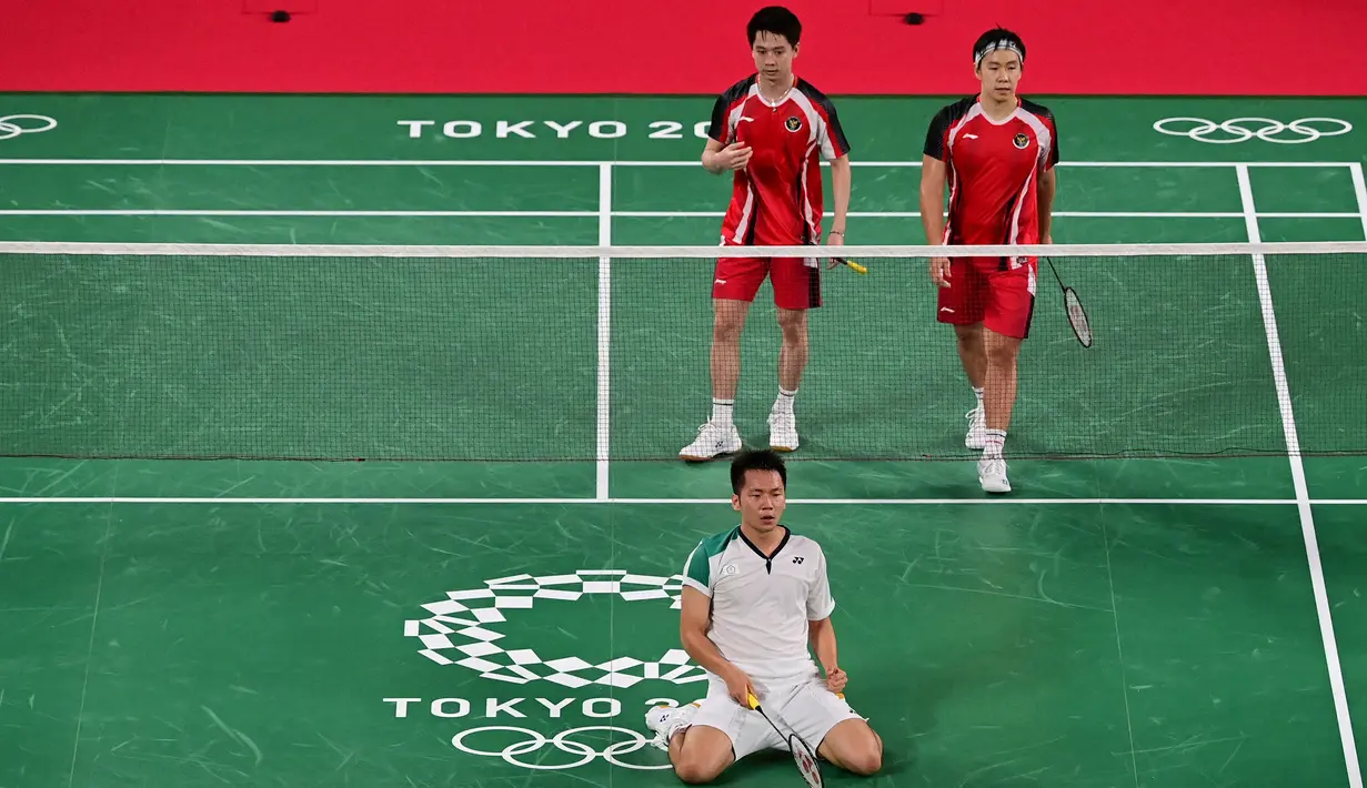 Dengan hasil ini, pasangan Indonesia harus turun diperingkat kedua dan keluar menjadi runner up klasemen sementara grup A Olimpiade Tokyo 2020. (Foto: AFP/Pedro Pardo)