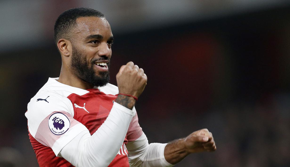 7. Alexandre Lacazette (Arsenal) - 12 gol dan 6 assist (AFP/Ian Kington)