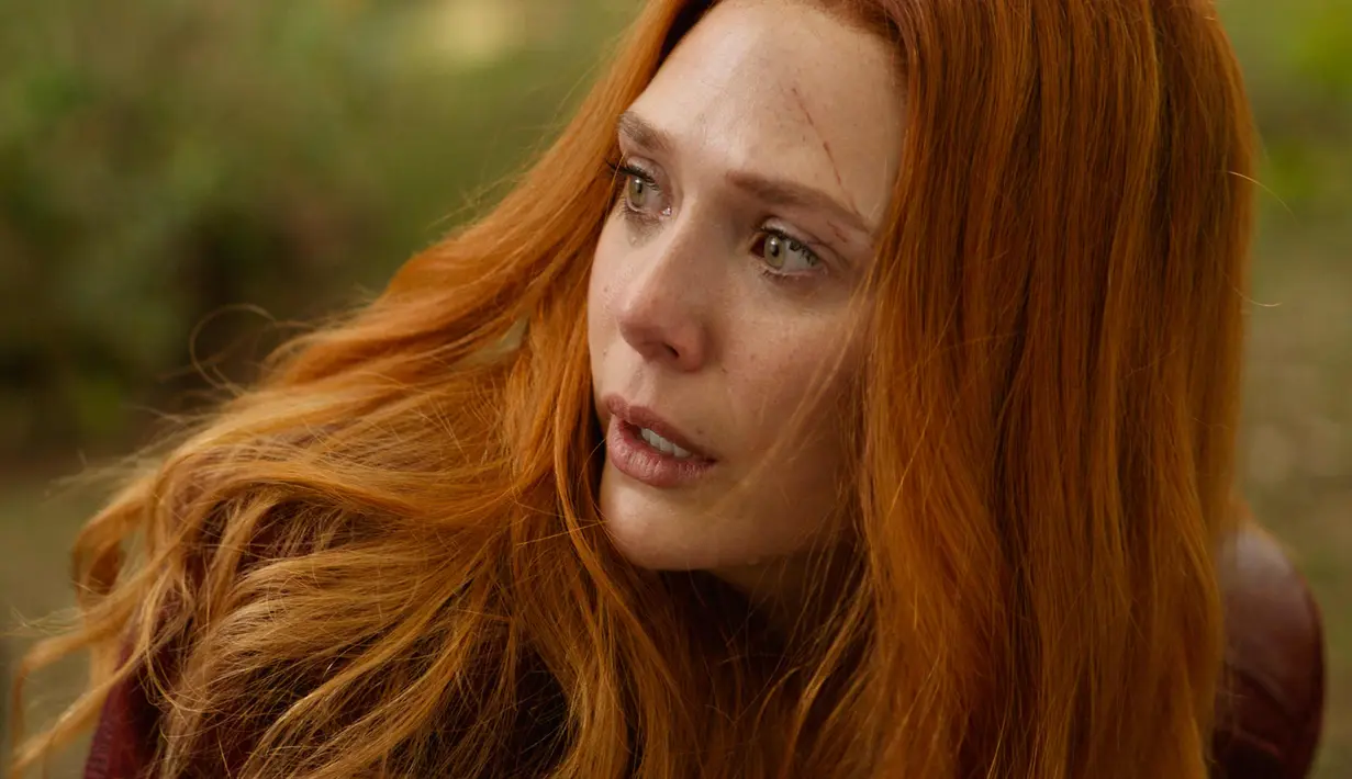 Aktris Elizabeth Olsen saat beradegan dalam film Avengers Infinity War. Film ini adalah sekuel dari The Avengers dan Avengers: Age of Ultron, serta merupakan film kesembilan belas dalam Marvel Cinematic Universe (MCU). (Marvel Studios via AP)
