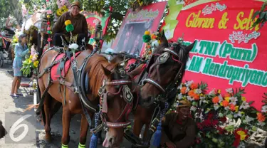 Penampakan kereta kencana pengiring pengantin Putra sulung Presiden Joko Widodo, Gibran Rakabuming Raka, Solo, Kamis (11/6/2015). Gibran menikahi Selvi Ananda dengan memakai adat Jawa. (Liputan6.com/Faizal Fanani) 