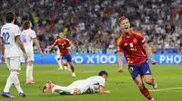 Ekspresi pemain Spanyol, Dani Olmo setelah menjebol gawang Prancis pada laga semifinal Euro 2024 di Allianz Arena, Munchen, Rabu (10/7/2024) dini hari WIB. (AP Photo/Manu Fernandez)