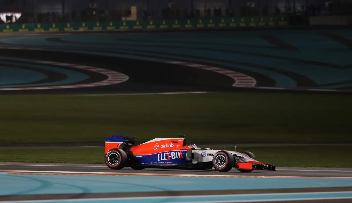 Pembalap Inggris, Will Stevens dari F1 Team Manor saat sesi latihan di Abu Dhabi 27 November 2015. Tim Manor melakukan debutnya di F1 pada musim 2010. Kala itu Manor terdaftar dengan Virgin Racing sesuai sponsor yang dibawa. (AFP PHOTO / KARIM SAHIB)