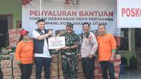 PT. Sentosa Laju Energi melalui yayasan SLE Foundation Peduli menyalurkan 600 paket sembako kepada ratusan warga terdampak kebakaran depo pertamina plumpang di posko koramil Tanah Merah Tanjung Priok Jakarta Utara (Istimewa)
