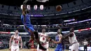 Aksi pemain Oklahoma City Thunder, Jerami Grant melakukan dunks saat melawan Chicago Bulls pada laga NBA basketball game di United Center, (9/1/2017). Thunder menang 109-94. (AP/Charles Rex Arbogast)