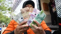 Ramai-Ramai Serbu Uang Lebaran, Waspada Duit Palsu