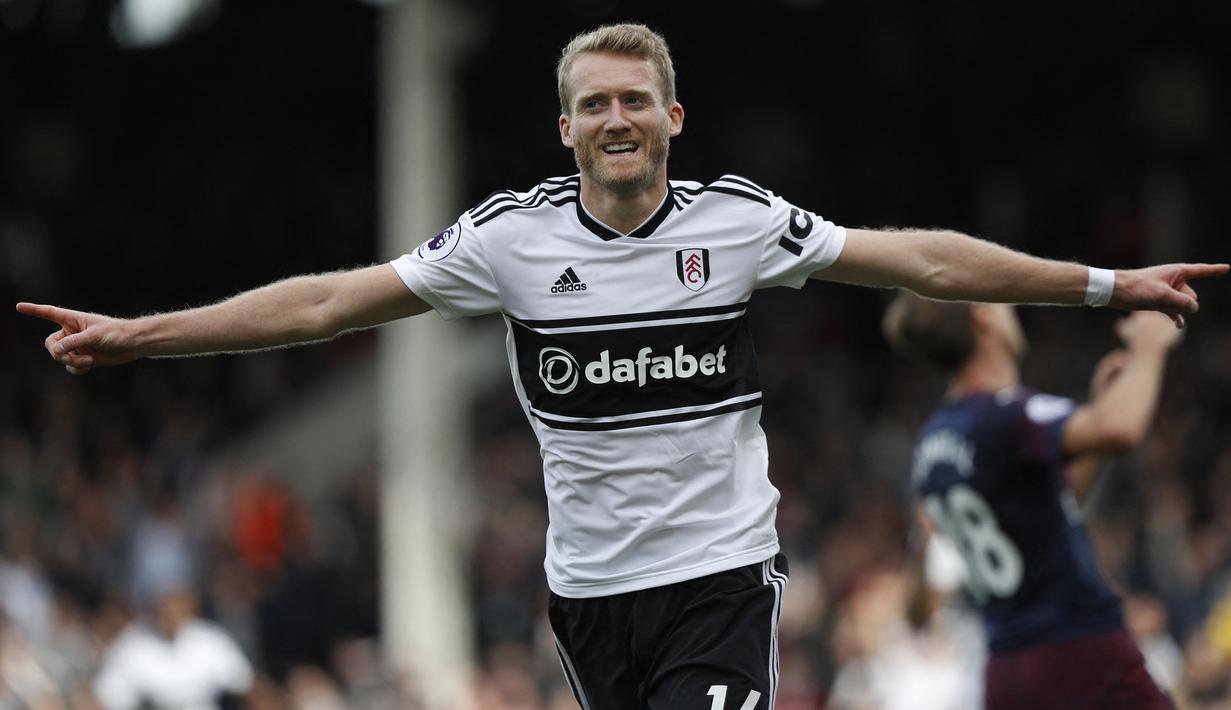 Andre Schurrle. Anggota skuat Timnas Jerman peraih trofi Piala Dunia 2014 ini pensiun di usia 29 tahun saat dipinjamkan Borussia Dortmund ke Spartak Moscow pada Juli 2020. Tekanan yang dirasakan saat berkarier menjadi alasan ia memutuskan pensiun dini dari sepak bola. (AFP/Adrian Dennis)